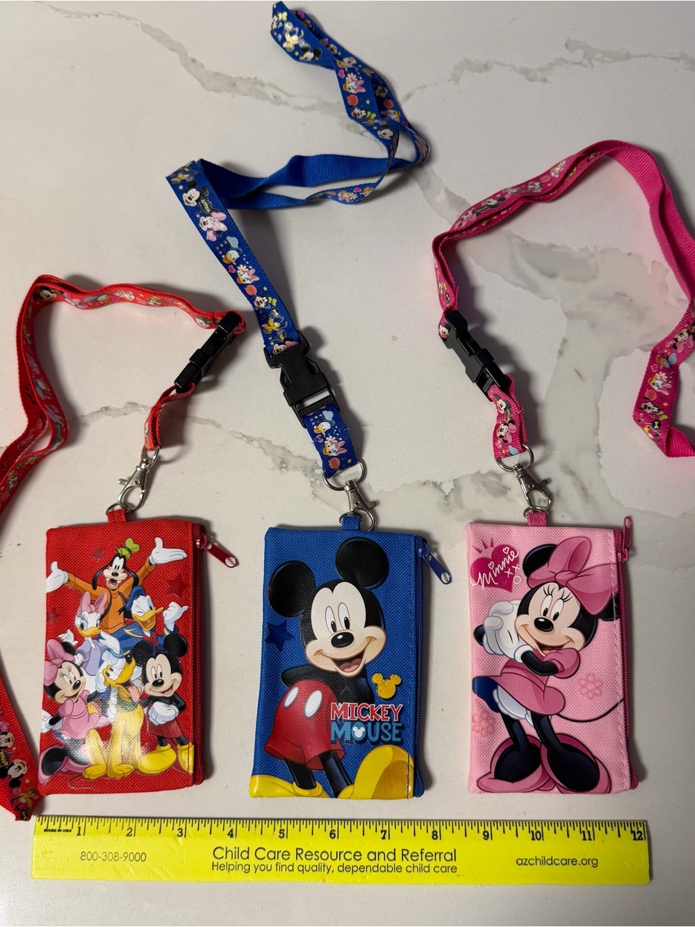 Disney ID holder wallets on lanyards